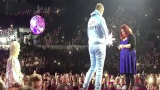 Man in "Left Shark" costume proposes on stage at Katy Perry concert