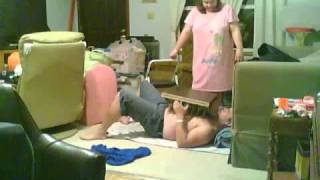 Amanda's Bouncing Bed of Nails on Brian's Bare Chest