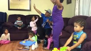 Gilberto singing praises with the children