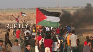 Israeli forces use tear gas as hundreds protest near border fence outside Khan Yunis