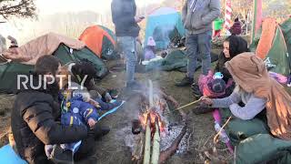 Belarus: Hundreds of migrants set up camp at Belarusian-Polish border