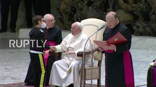 Holy See: Child climbs up to podium, greets Pope Francis, and gets a zucchetto hat