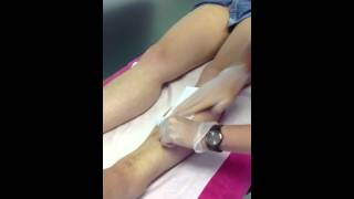 Lycon strip wax on legs