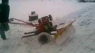 мотоблок с лопатой отвалом.