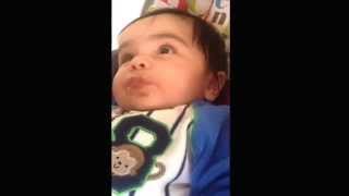 Christopher's first time eating baby food