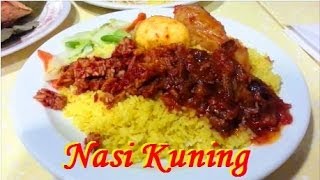 Makan Nasi Kuning (Eating Yellow Rice)