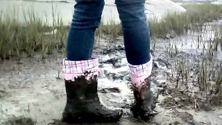 Littles pink rubber boots in mud