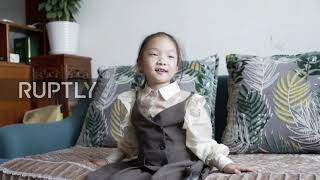 Six-year-old Chinese girl brushes past peers with outstanding calligraphy skills