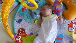 How newborn baby responds to a playmat with toys