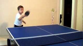 Polish Kid playing ping pong (table tennis)