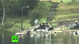 Aerial video: Norway shooting survivors in sea, search for bodies in Utoya