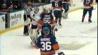 Robin Lehner bumps into Kevin Poulin