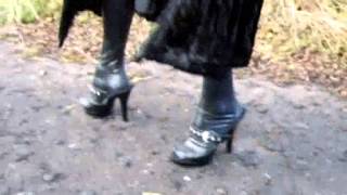 Femdom out walking in her rubber stockings