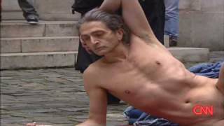 Nude models strike a pose