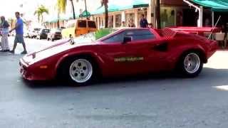 Red Lamborghini Countach driving in Miami Beach