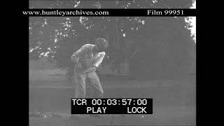 Keep Calm and Carry On, Gas Mask Wearing Golfer, 1939.  Archive film 99951