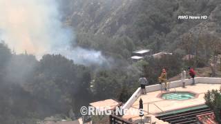 Brush fire threatens homes in Pacific Palisades, California. May 4 2014