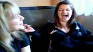 young smoking chicks enjoyign a cig together