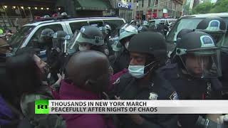 Thousands march in New York amid curfew