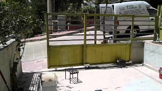 Τηλεσκοπικη συρομενη γκαραζοπορτα