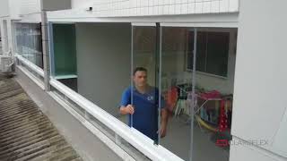 Безрамное остекление балкона системой Claroflex® Pivot
