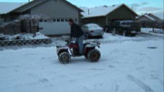1984 honda trx200 in the snow