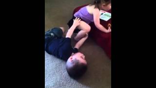Addison pinned big brother and then took his food