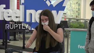 Australia: Families reunite at Sydney airport as int borders reopen to vaxxed travellers