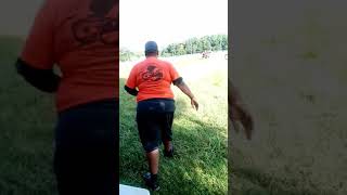 Fat girl carry tires over shoulders