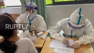 China: Nanjing launches citywide testing after COVID cluster found at airport