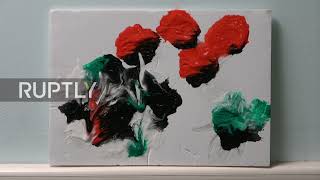 Rescue dog Banksy paints to find forever home in Bristol