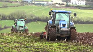 Ploughing with John Deere and New Holland.