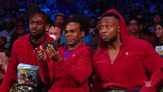 Big E eats popcorn at ringside