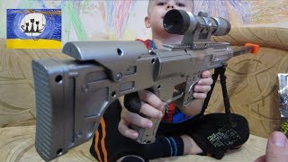 МУЗЫКАЛЬНЫЙ АВТОМАТ с ножками .Свет и звуки выстрела.