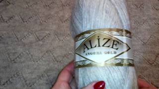 Начала вязать палантин из Alize angora gold