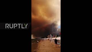 Turkey: Smoke billows over Antalya beach as wildfires force evacuations