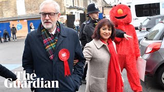 Protester in Elmo suit restrained as Jeremy Corbyn arrives to vote