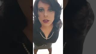 elegant crossdresser in black satin blouse and pencil skirt - Christina d`Yvon
