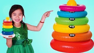 Jannie Learns Sizes with Giant Stacking Rings