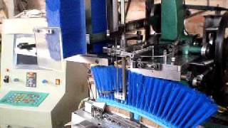 Maquina Insertadora de escobas / broom machine