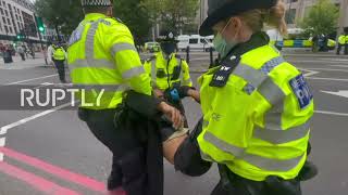 UK: Scuffles break out as Extinction Rebellion demonstrators block London's Tower Bridge