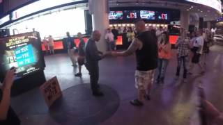 Big ass guy kicks dude in the nuts Fremont Street