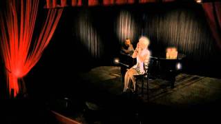 Watch Christina perform "Bound to You"