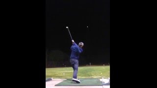 Dude hitting golf balls