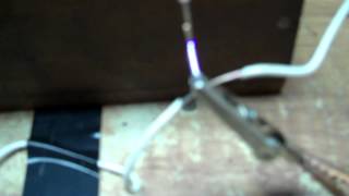 Model T spark coil testing after point cleaning and adjustment