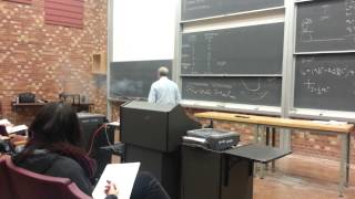 Professor Vitaly Efimov shoots gun in class