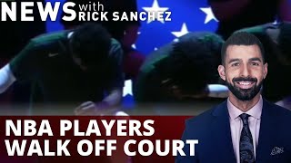 NBA players walk off court, kneel during anthem