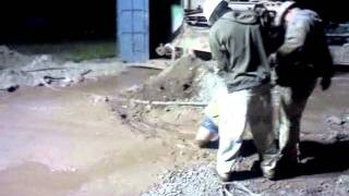 Crazy safety foreman girl runs through deep mud