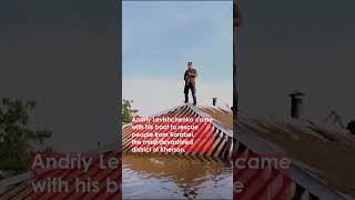Man Plays Saxaphone On Roof of Flooded Ukranian House