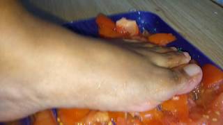 Squashing tomatoes with my feet